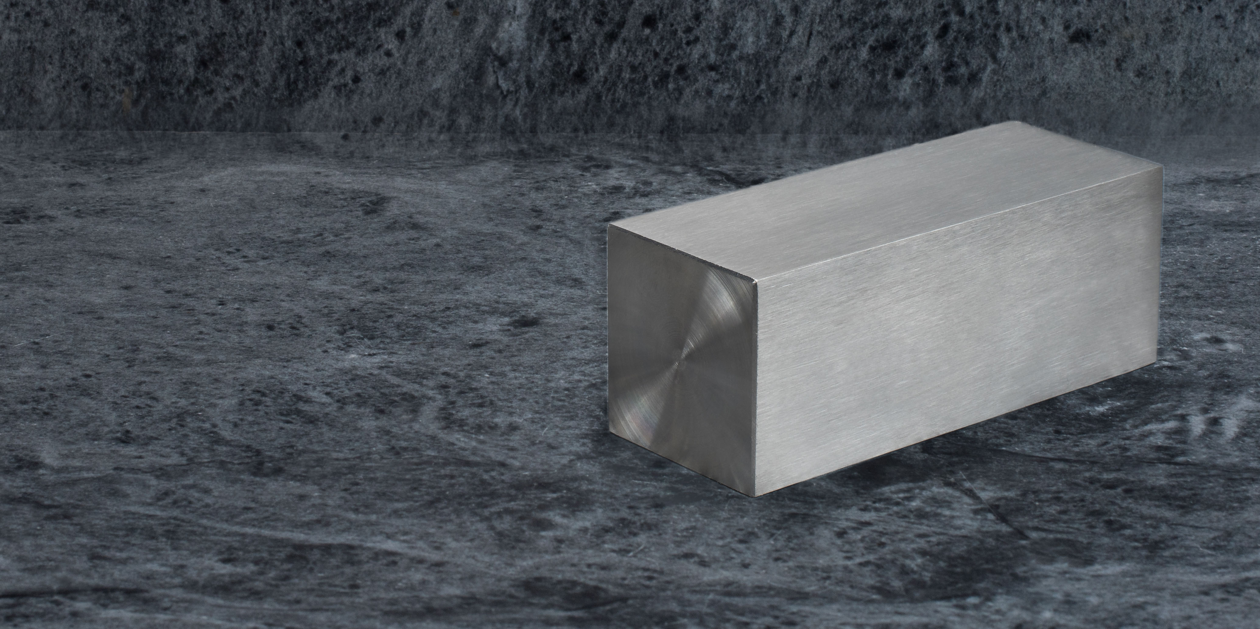 A square steel bar section.